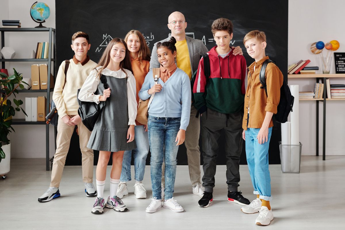 Students and a teacher in a classroom